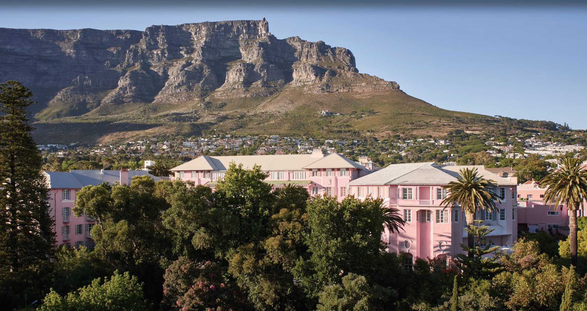 The Mount Nelson's pink facade beneath Table Mountain